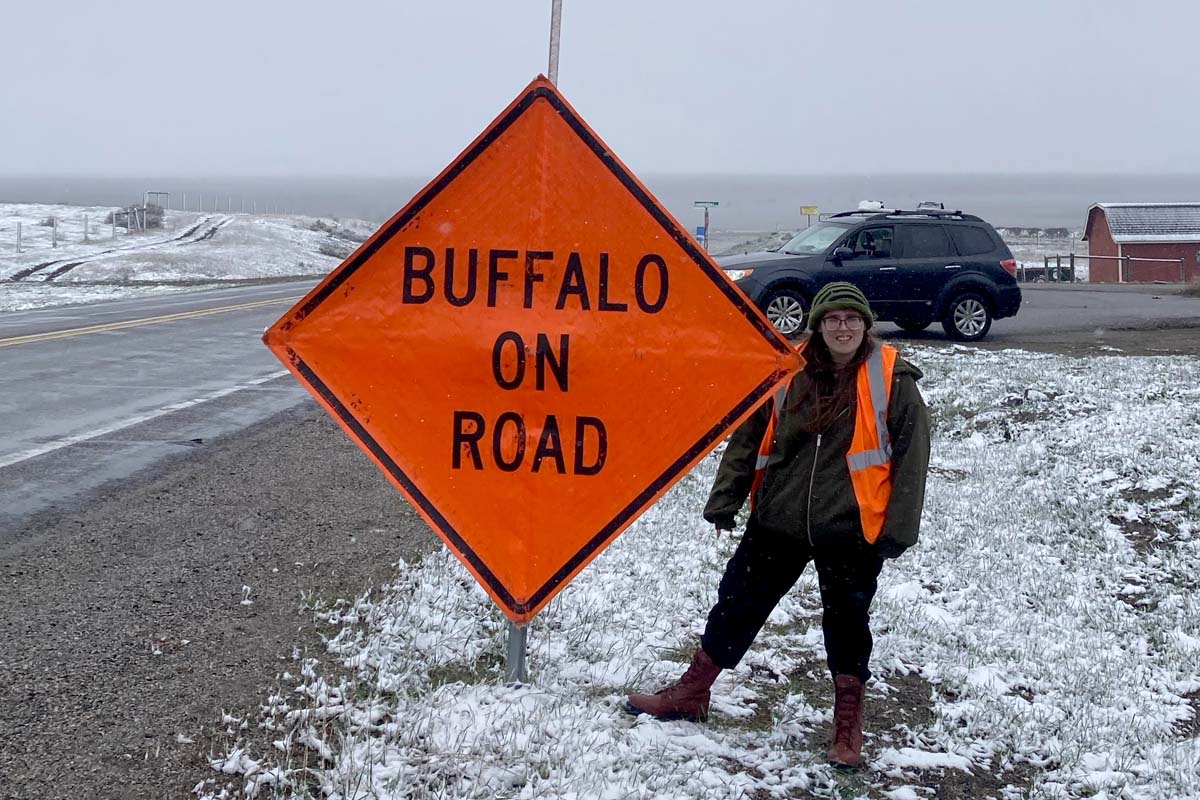 Volunteer w Road Sign